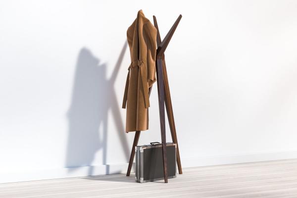 Coat on the hanger and suitcase